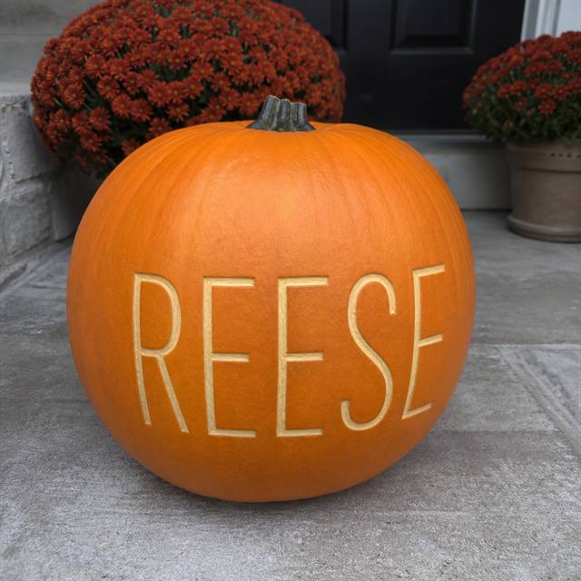 A pumpkin laser-engraved with the name Reese